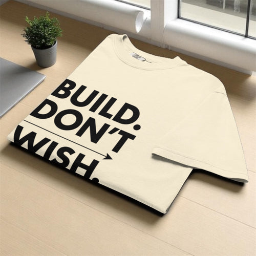 BUILD. DON’T WISH. – Premium Heavyweight Garment-Dyed Unisex Tee